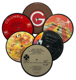 Upcycled Vinyl Records turned into coffee table coasters with Big G logo printed on opposite side of original record label