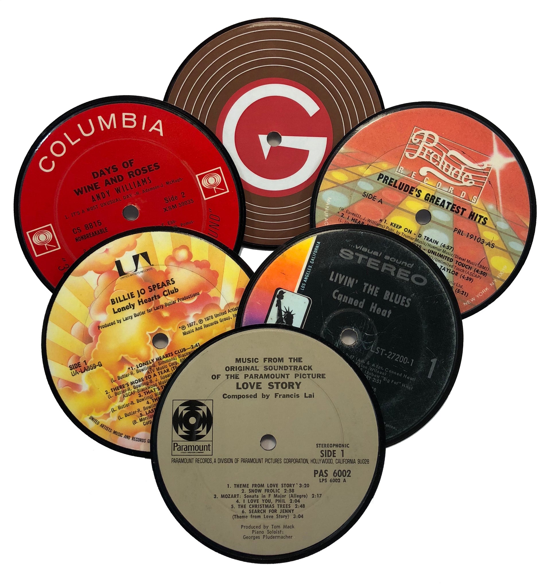 Upcycled Vinyl Records turned into coffee table coasters with Big G logo printed on opposite side of original record label