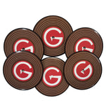 Upcycled Vinyl Records turned into coffee table coasters with Big G logo printed on opposite side of original record label