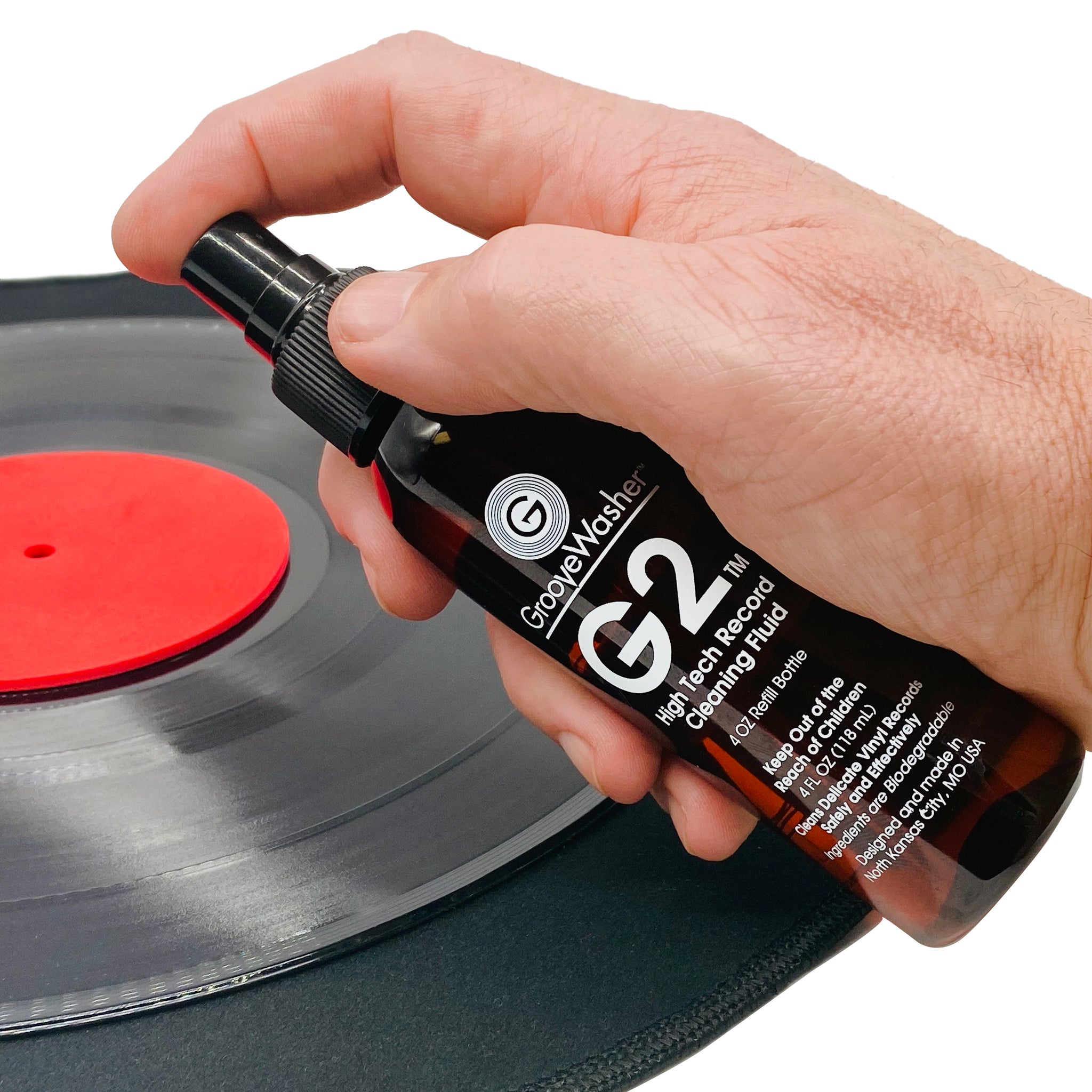 GrooveWasher G2 Cleaning Fluid sprayed on record with record label protector